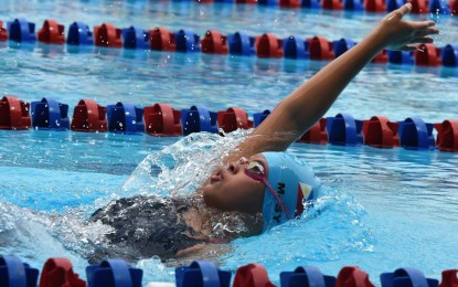 <p>WINNING FORM. Mishka Sy in action during the girls 13-under 200-meter backstroke event of the 42nd SEA Age Group Swimming Championships at the Trace Aquatics Center in Los Banos Laguna on Saturday. <em>(Photo courtesy of Philippine Swimming Inc.)</em></p>